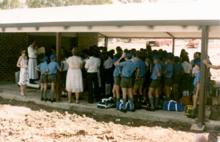 Students gathered in early school conditions representing the beginnings of community and student life at Trinity College Beenleigh