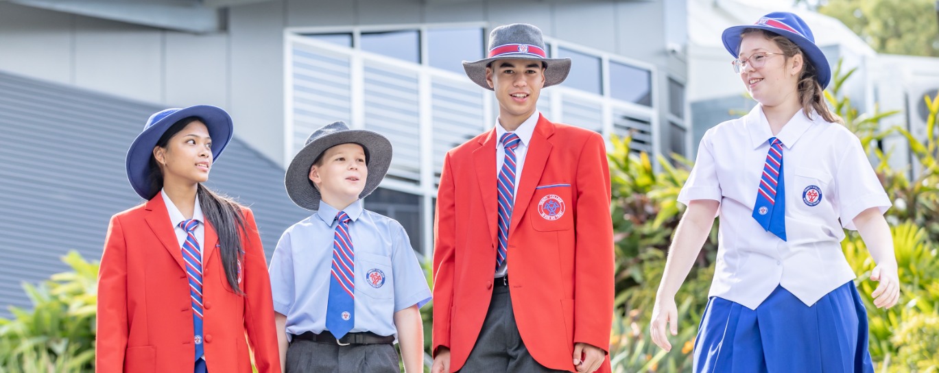 Students in school uniform at Trinity College Beenleigh walking together and representing connection belonging and school pride
